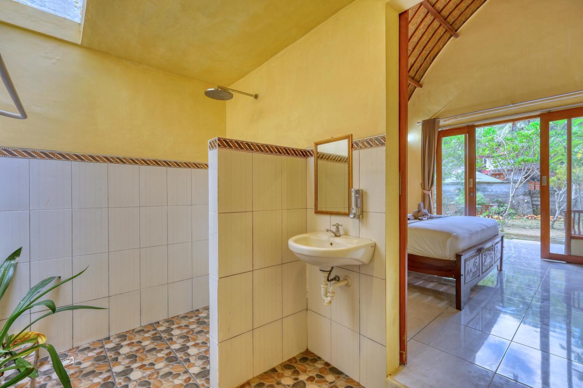 Maharga Bungalows Sakti Rum bild